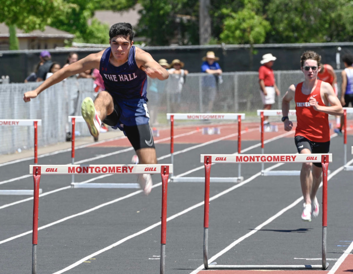 Sophomore Shail Kulkarni race in the 300 hurdles race. 